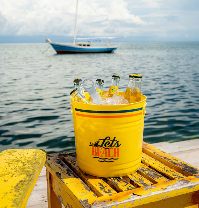 Palapa Bar & Grill serves buckets of beer that you can enjoy while looking out on the water