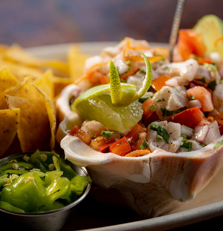Island Ceviche served in a seashell at Palapa Bar and Grill in San Pedro, Belize
